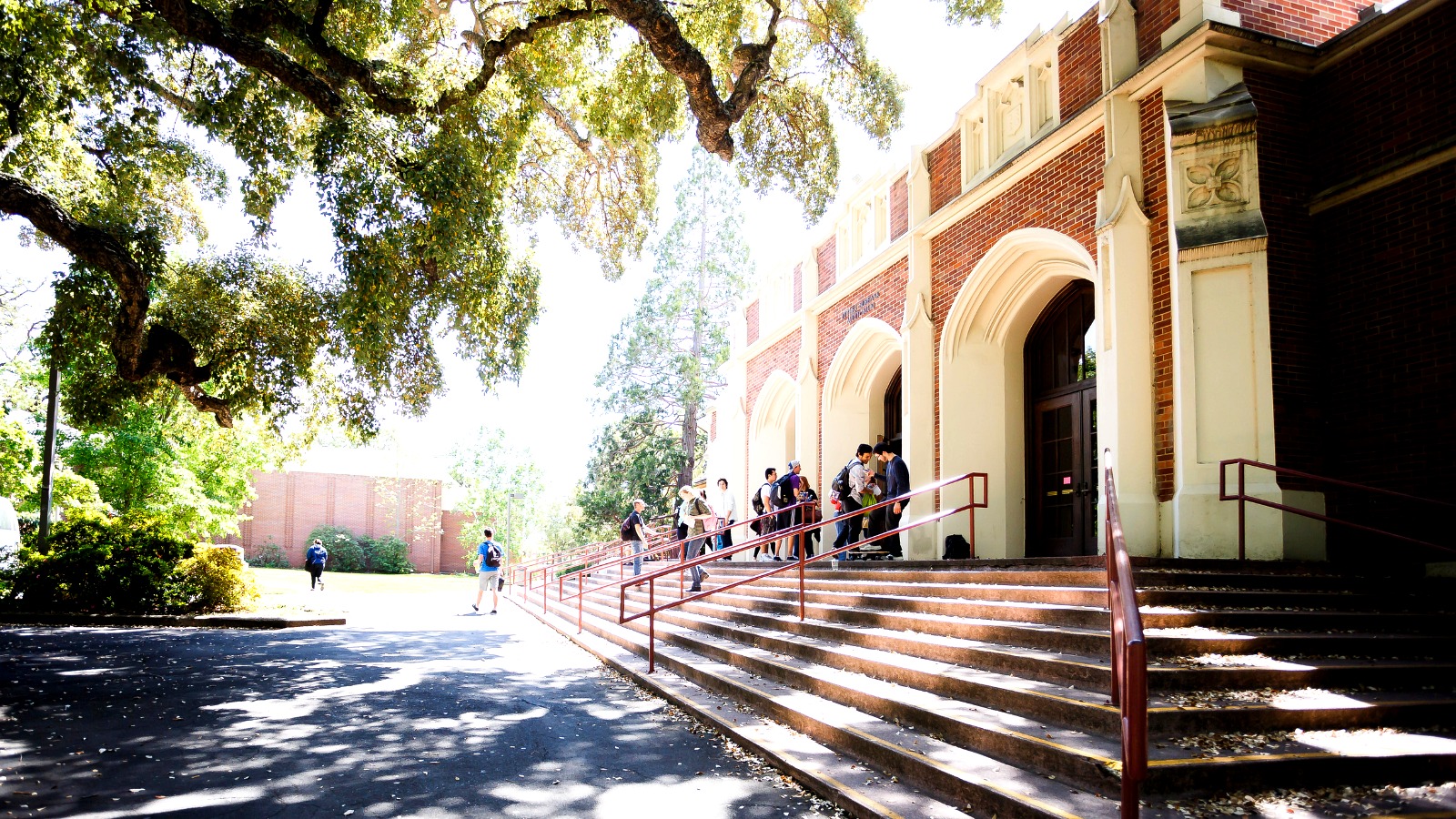 An auditorium with tiered seating and stage lighting inside SRJC's Burbank Auditorium.